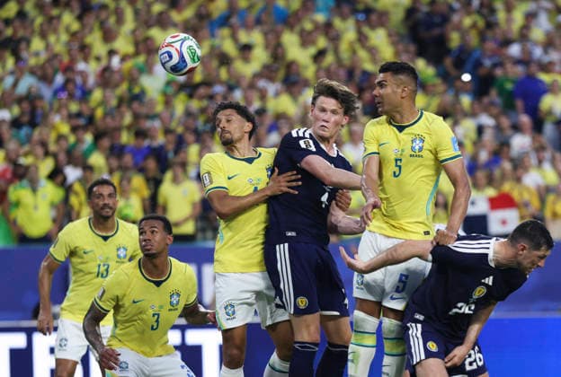 (260625) -- MIAMI, June 25, 2026 -- Players fight for a headball during the group C match between Scotland and Brazil at the 2026 FIFA World Cup, WM, Weltmeisterschaft, Fussball at Miami Stadium, Miami, the United States, June 24, 2026. ) (SP)U.S.-MIAMI-FOOTBALL-FIFA WORLD CUP-GROUP C-SCO VS BRA XuxZijian 