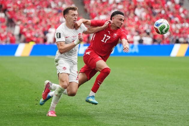 June 24, 2026, Vancouver, Bc, CANADA: Canada s Alistair Johnston (2) and Switzerland s Ruben Vargas (17) vie for the ball during the second half of a World Cup Group B soccer match, in Vancouver, on Wednesday, June 24, 2026. Canada News - June 24, 2026  - ZUMAc35_ 20260624_zaf_c35_219 Copyright: xDarrylxDyckx