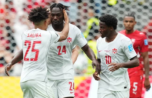 June 24, 2026, Vancouver, Bc, CANADA: Canada s Promise David (24) celebrates his goal against Switzerland with Nathan-Dylan Saliba (25) and Jonathan David (10) during the second half of a World Cup Group B soccer match, in Vancouver, on Wednesday, June 24, 2026. Canada News - June 24, 2026  - ZUMAc35_ 20260624_zaf_c35_225 Copyright: xEthanxCairnsx