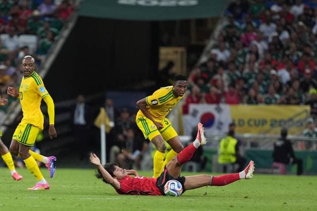 South Africa v South Korea - FIFA World Cup, WM, Weltmeisterschaft, Fussball 2026 - Group A MONTERREY, MEXICO - JUNE 24: Thalente Mbatha (5) of South Africa in action against Seol Young-woo (ground) of South Korea during the 2026 FIFA World Cup First Stage Group A match between South Africa and South Korea at Estadio BBVA (Monterrey Stadium) in Monterrey, Mexico on June 24, 2026. Juancho Torres Anadolu Nuevo Leon Mexico. Editorial use only. Please get in touch for any other usage.  Copyright: x2026xAnadoluxJuanchoxTorresx