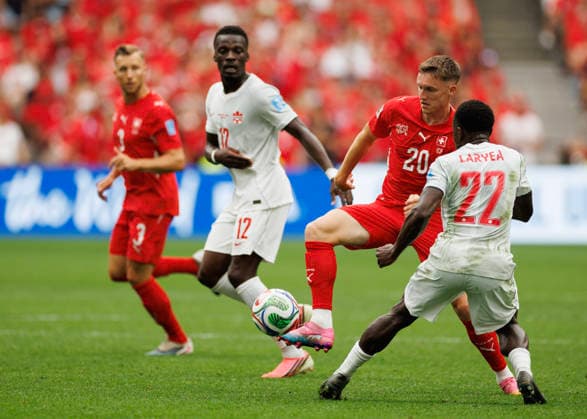 June 24, 2026, Vancouver, British Columbia, Canada: Michel Aebischer 20 of Switzerland controls the ball during the FIFA World Cup, WM, Weltmeisterschaft, Fussball 2026 Group B match between Switzerland and Canada at BC Place Vancouver. World Cup 2026: Group B Switzerland 2:1 Canada  - ZUMAc132 20260624_fap_c132_020 Copyright: xAndrewxChinx