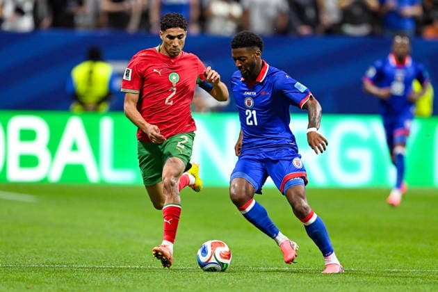 ATLANTA, GA - JUNE 24: Achraf Hakimi 2 of Morocco and Josue Casimir 21 of Haiti battle for possession during the FIFA World Cup, WM, Weltmeisterschaft, Fussball 2026 Group C match between Morocco and Haiti on June 24th, 2026 at Atlanta Stadium in Atlanta, GA. (Photo by Rich von Biberstein Icon Sportswire) SOCCER: JUN 24 FIFA World Cup 26 Group C - Morocco vs Haiti EDITORIAL USE ONLY Icon260624030
