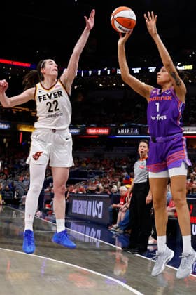 INDIANAPOLIS, IN - JUNE 24: Phoenix Mercury forward Noemie Brochant (1) knocks down her shot while defended by Indiana Fever guard Caitlin Clark (22) in the second quarter of play during a WNBA, Basketball Damen, USA game between the Phoenix Mercury and the Indiana Fever on June 24, 2026 at Gainbridge Fieldhouse in Indianapolis, IN. (Photo by Jeffrey Brown Icon Sportswire) WNBA: JUN 24 Phoenix Mercury at Indiana Fever EDITORIAL USE ONLY Icon002626010