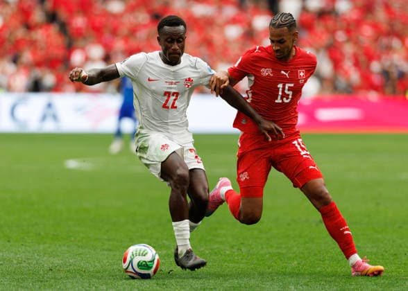 June 24, 2026, Vancouver, British Columbia, Canada: Richie Laryea 22 of Canada is challenged by Djibril Sow 15 of Switzerland during the FIFA World Cup, WM, Weltmeisterschaft, Fussball 2026 Group B match between Switzerland and Canada at BC Place Vancouver. World Cup 2026: Group B Switzerland 2:1 Canada  - ZUMAc132 20260624_fap_c132_029 Copyright: xAndrewxChinx