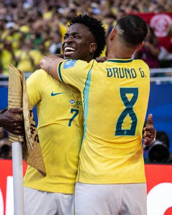 Bruno Guimaraes of Brazil (R) hugs Vinicius Junior of Brazil (L) during a FIFA Men’s World Cup 2026 Group Stage football match between Scotland and Brazil at Miami Stadium, in Miami Gardens on June 24th 2026 (Photo by Ricardo Nogueira SPP)  Copyright: xRicardoxNogueira SPPx Sportspressphoto_SPR176100