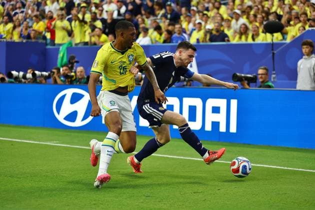 Andy Robertson of Scotland competes for the ball with Rayan of Brazil Scotland v Brazil, 2026 FIFA World Cup, WM, Weltmeisterschaft, Fussball Group C, Football, Miami Stadium, Miami, Florida, USA - 24 Jun 2026Miami Miami Stadium Florida (FL) United States of America EDITORIAL USE ONLY No use with unauthorised audio, video, data, fixture lists, club league logos or live services. Online in-match use limited to 120 images, no video emulation. No use in betting, games or single club league player publications.  Copyright: xMichaelxZemanek Shutterstockx 16956031eg