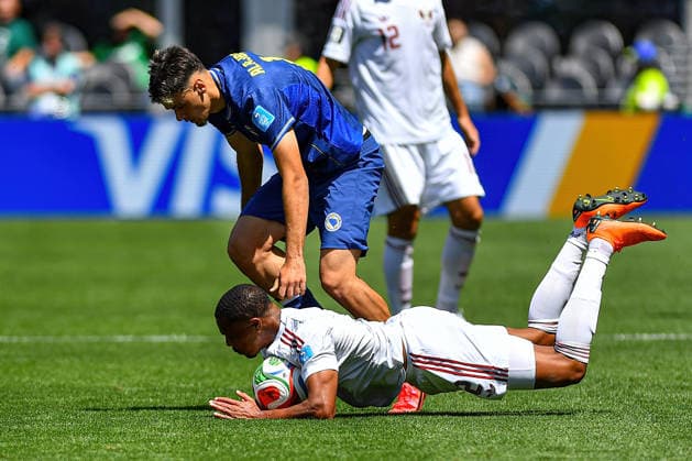 June 24, 2026: Qatar defender RoÂ³-RoÂ³ (2) goes down during the FIFA World Cup, WM, Weltmeisterschaft, Fussball match between Bosnia - Herzegovina and Qatar in Seattle, WA.Bosnia - Herzegovina defeated Qatar 3-1. CSM Seattle United States - ZUMAc04_ 20260624_zma_c04_045 Copyright: xStevexFaberx