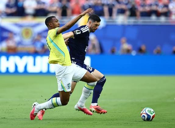Scott McKenna of Scotland competes for the ball with Rayan of Brazil Scotland v Brazil, 2026 FIFA World Cup, WM, Weltmeisterschaft, Fussball Group C, Football, Miami Stadium, Miami, Florida, USA - 24 Jun 2026Miami Miami Stadium Florida (FL) United States of America EDITORIAL USE ONLY No use with unauthorised audio, video, data, fixture lists, club league logos or live services. Online in-match use limited to 120 images, no video emulation. No use in betting, games or single club league player publications.  Copyright: xMichaelxZemanek Shutterstockx 16956031fj