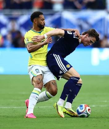 Scott McTominay of Scotland competes for the ball with Matheus Cunha of Brazil Scotland v Brazil, 2026 FIFA World Cup, WM, Weltmeisterschaft, Fussball Group C, Football, Miami Stadium, Miami, Florida, USA - 24 Jun 2026Miami Miami Stadium Florida (FL) United States of America EDITORIAL USE ONLY No use with unauthorised audio, video, data, fixture lists, club league logos or live services. Online in-match use limited to 120 images, no video emulation. No use in betting, games or single club league player publications.  Copyright: xMichaelxZemanek Shutterstockx 16956031fq