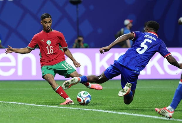(260625) -- ATLANTA, June 25, 2026 -- Gessime Yassine (L) of Morocco vies with Hannes Delcroix of Haiti during the group C match between Morocco and Haiti at the 2026 FIFA World Cup, WM, Weltmeisterschaft, Fussball at Atlanta Stadium in Atlanta, the United States, June 24, 2026. ) (SP)U.S.-ATLANTA-FOOTBALL-FIFA WORLD CUP-GROUP C-MAR VS HTI WangxKaiyan 