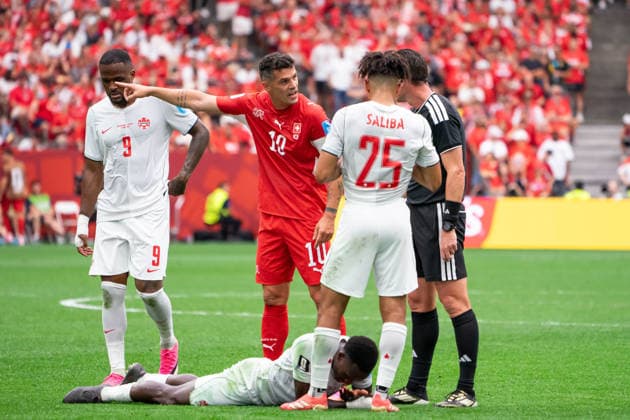 VANCOUVER, CANADA - JUNE 24: Granit Xhaka of Switzerland argues with the official after Derek Cornelius of Canada falls down during the FIFA World Cup, WM, Weltmeisterschaft, Fussball 2026 group stage match between Canada and Switzerland at BC Place Vancouver Stadium on June 24, 2026 in Vancouver, British Columbia, Canada.  Copyright: xAmyxElle SPPx Sportspressphoto_SPR176208