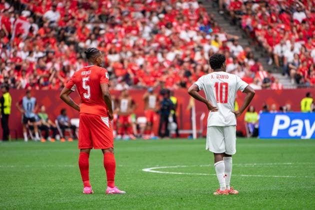 VANCOUVER, CANADA - JUNE 24: Manuel Akanji of Switzerland and Jonathan David of Canada wait for play to resume during the FIFA World Cup, WM, Weltmeisterschaft, Fussball 2026 group stage match between Canada and Switzerland at BC Place Vancouver Stadium on June 24, 2026 in Vancouver, British Columbia, Canada.  Copyright: xAmyxElle SPPx Sportspressphoto_SPR176234