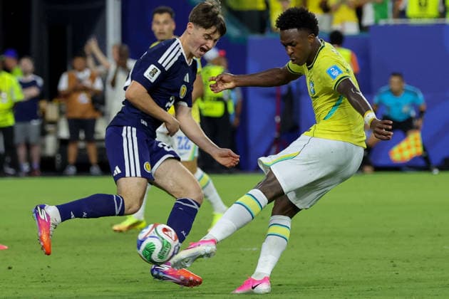 MIAMI GARDENS, FL - JUNE 24: Vinicius Junior 7 of Brazil shoots on goal as Findlay Curtis 25 of Scotland attempts to block during a FIFA World Cup, WM, Weltmeisterschaft, Fussball 2026 Group C match between Scotland and Brazil on June 24,2026 at Miami Stadium, in Miami Gardens, Fla.(Photo by Chris Arjoon Icon Sportswire) SOCCER: JUN 24 FIFA World Cup 26 Group C - Scotland vs Brazil EDITORIAL USE ONLY Icon26062400100059