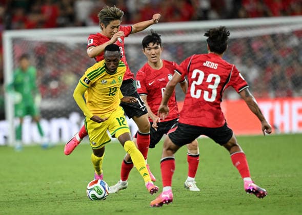(260625) -- MONTERREY, June 25, 2026 -- Thapelo Maseko (1st L) of South Africa vies players of South Korea during a group A match between South Africa and South Korea at the 2026 FIFA World Cup, WM, Weltmeisterschaft, Fussball at Estadio Monterrey in Monterrey, Mexico, on June 24, 2026. ) (SP)MEXICO-MONTERREY-FOOTBALL-FIFA WORLD CUP-GROUP A-RSA VS KOR WuxWei 