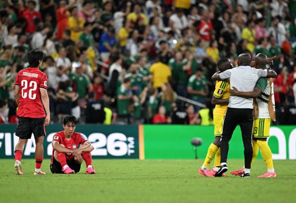 (260625) -- MONTERREY, June 25, 2026 -- Players of South Korea look on as players of South Africa celebrate victory after a group A match between South Africa and South Korea at the 2026 FIFA World Cup, WM, Weltmeisterschaft, Fussball at Estadio Monterrey in Monterrey, Mexico, on June 24, 2026. ) (SP)MEXICO-MONTERREY-FOOTBALL-FIFA WORLD CUP-GROUP A-RSA VS KOR WuxWei 