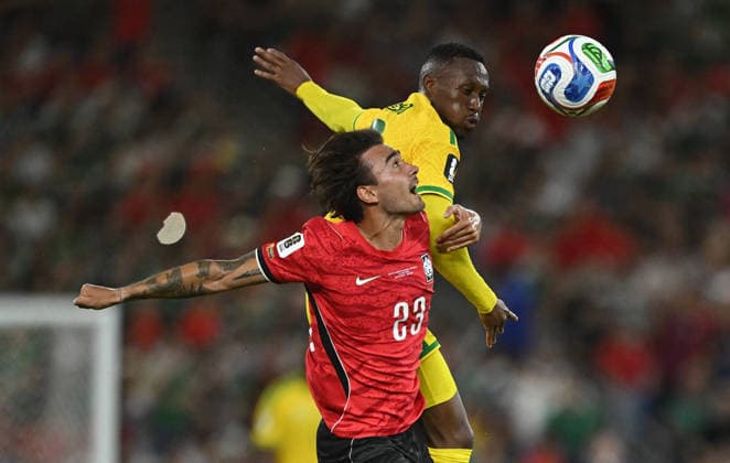 (260625) -- MONTERREY, June 25, 2026 -- Jens Castrop (front) of South Korea fights for a headball during a group A match between South Africa and South Korea at the 2026 FIFA World Cup, WM, Weltmeisterschaft, Fussball at Estadio Monterrey in Monterrey, Mexico, on June 24, 2026. (Photo by Xinhua) (SP)MEXICO-MONTERREY-FOOTBALL-FIFA WORLD CUP-GROUP A-RSA VS KOR LucioxTavora 