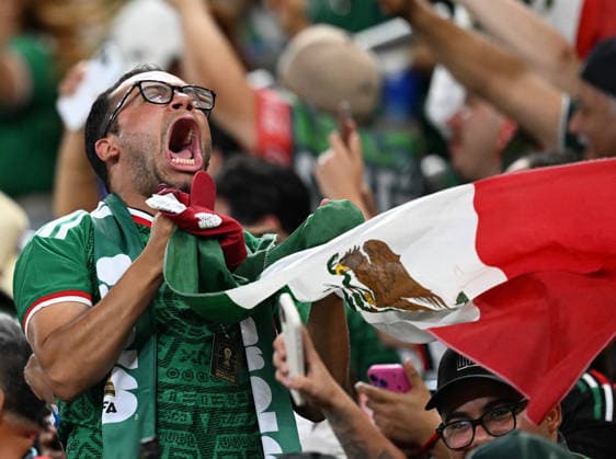 (260625) -- MONTERREY, June 25, 2026 -- A fan of Mexico celebrates upon hearing the news of Mexico s goal while watching a group A match between South Africa and South Korea at the 2026 FIFA World Cup, WM, Weltmeisterschaft, Fussball at Estadio Monterrey in Monterrey, Mexico, on June 24, 2026. ) (SP)MEXICO-MONTERREY-FOOTBALL-FIFA WORLD CUP-GROUP A-RSA VS KOR WuxWei 