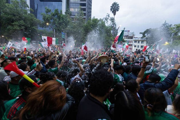 June 24, 2026, Mexico City, Mexico: Supporters of the Mexican national team, Nationalteam gathered around the Angel of Independence in Mexico City to watch the 2026 FIFA World Cup, WM, Weltmeisterschaft, Fussball match between Mexico and Czechia on a giant screen. At the same time, relatives of missing persons and search collectives held a soccer match for memory and against forgetting at the Roundabout of the Disappeared to raise awareness about the crisis of missing persons in Mexico. Mexico City Mexico - ZUMAl178 0859970423st Copyright: xCristianxLeyvax