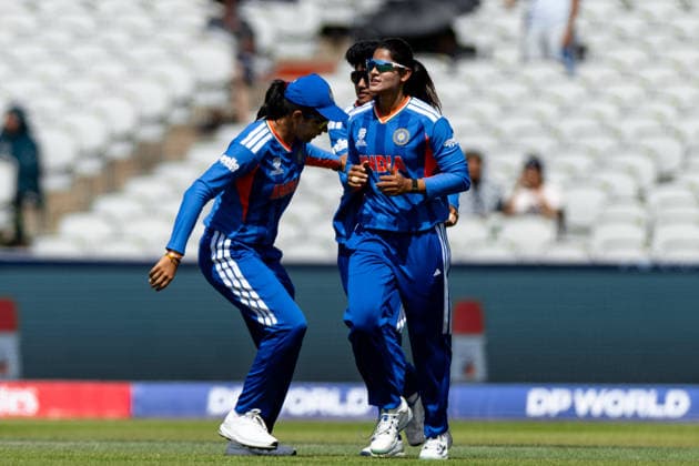 MANCHESTER, ENGLAND - JUNE 25: Radha Yadav, Jemimah Rodrigues and N Sree Charani of India celebrate during the ICC Women s T20 World Cup match between India and Bangladesh at Old Trafford Cricket Ground on June 25, 2026 in Manchester, England.  Copyright: xUnnatixNaidux Sportspressphoto_SPR176465