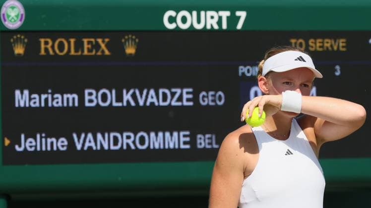 Belgian Jeline Vandromme reacts during a tennis match against Georgian Bolkvadze, a qualifier for the women s singles at the Wimbledon grand slam tennis tournament in London, Britain, Thursday 25 June 2026. The main tournament is starting next Monday. BENOITxDOPPAGNE  x179241677x