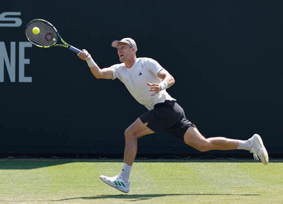 RECORD DATE NOT STATED 25th June 2026; Devonshire Park Lawn Tennis Club, Eastbourne, East Sussex, England; Lexus Eastbourne Open Tennis, Day Five; Jan Choinski (GBR) plays a forehands shot against Zizou Bergs (BEL) HongboxChen