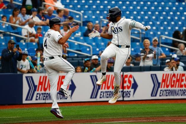 June 25, 2026, St. Petersburg, Florida, USA: Tampa Bay Rays third baseman Junior Caminero (13) celebrates with third base coach Brady Williams (4), after he hits a two-run homer off of Kansas City Royals pitcher Seth Lugo (67) during the first inning at Tropicana Field on Thursday, June 25, 2026, in St. Petersburg. St. Petersburg USA - ZUMAs70_ 0860023725st Copyright: xJeffereexWoox