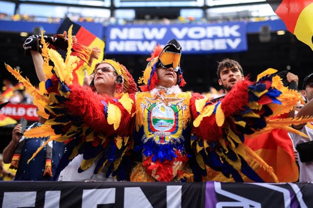 Football - FIFA World Cup, WM, Weltmeisterschaft, Fussball - Group E - Ecuador v Germany 25th June 2026 - FIFA World Cup - Group E - Ecuador v Germany - An Ecuador fan in a Germany fan section - Photo: Simon Stacpoole Offside. New Jersey USA *** Fußball – FIFA-Weltmeisterschaft, Gruppe E: Ecuador gegen Deutschland, 25. Juni 2026 – FIFA-Weltmeisterschaft, Gruppe E: Ecuador gegen Deutschland – Ein ecuadorianischer Fan im deutschen Fanblock. Foto: Simon Stacpoole, Offside, New Jersey, USA  Copyright: xSimonxStacpoolexOffside