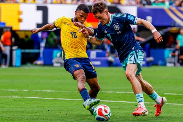Florian Wirtz of Germany and Pedro Vite of Ecuador battle for the ball , Group E - FIFA World Cup, WM, Weltmeisterschaft, Fussball 2026, Ecuador v Germany, New York New Jersey Stadium, June 25, 2026, East Rutherford, United States.