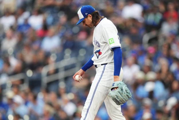 June 25, 2026, Toronto, On, CANADA: Toronto Blue Jays pitcher Kevin Gausman (34) reacts after giving up a solo home run to Texas Rangers designated hitter Joc Pederson during first inning MLB, Baseball Herren, USA baseball action in Toronto, on Thursday, June 25, 2026. Canada News - June 25, 2026  - ZUMAc35_ 20260625_zaf_c35_104 Copyright: xNathanxDenettex
