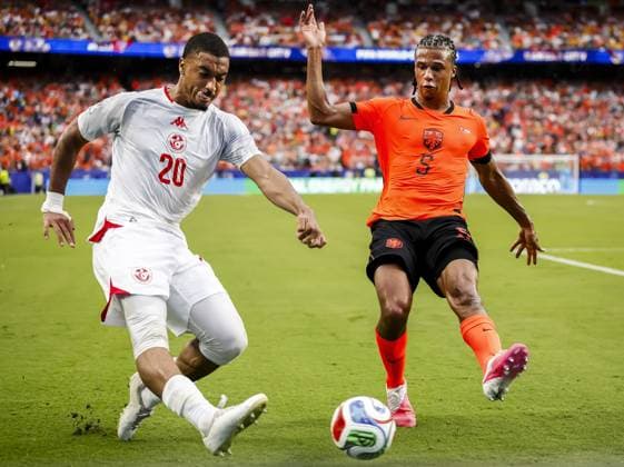 KANSAS - Yan Valery of Tunisia and Nathan Ake of the Netherlands during the FIFA 2026 World Cup Group F match between Tunisia and the Netherlands at Kansas City Stadium on June 25, 2026, in Kansas, United States. KOEN VAN WEEL ANP FIFA World Cup, WM, Weltmeisterschaft, Fussball 2026 group stage 2026 xVIxANPxSportx xxANPxIVx 561995883 originalFilename: 561995883.jpg