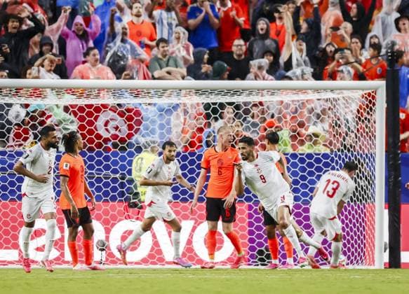 KANSAS - Hazem Mastouri of Tunisia scores the 1-2 during the 2026 FIFA World Cup, WM, Weltmeisterschaft, Fussball Group F match between Tunisia and the Netherlands at Kansas City Stadium on June 25, 2026, in Kansas, United States. KOEN VAN WEEL ANP FIFA World Cup 2026 group stage 2026 xVIxANPxSportx xxANPxIVx 561997135 originalFilename: 561997135.jpg