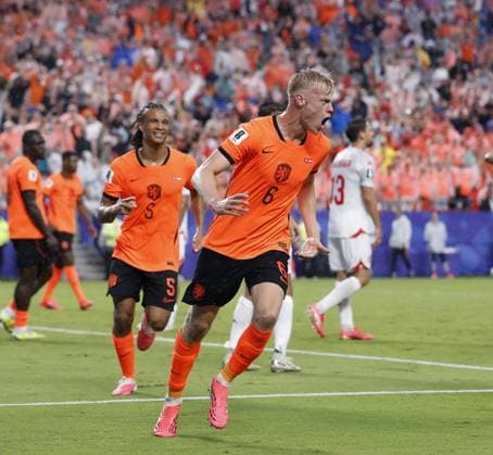 KANSAS - Jan Paul van Hecke of the Netherlands celebrates the 1-3 during the 2026 FIFA World Cup, WM, Weltmeisterschaft, Fussball Group F match between Tunisia and the Netherlands at Kansas City Stadium on June 25, 2026, in Kansas, United States. ROBIN VAN LONKHUIJSEN ANP FIFA World Cup 2026 group stage 2026 xVIxANPxSportx xxANPxIVx 561998615 originalFilename: 561998615.jpg