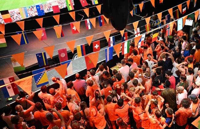 Dutch supporters gather in Rotterdam for Netherlands-Tunisia World Cup match ROTTERDAM, NETHERLANDS - JUNE 26: Dutch football supporters dressed in orange gather across Rotterdam to watch the Netherlands face Tunisia in the FIFA World Cup, WM, Weltmeisterschaft, Fussball in Rotterdam, Netherlands on June 26, 2026. Fans filled public viewing areas, cafes and city squares, creating a vibrant atmosphere as they cheered on the national team, Nationalteam during the group-stage fixture. Mouneb Taim Anadolu Rotterdam Netherlands. Editorial use only. Please get in touch for any other usage.  Copyright: x2026xAnadoluxMounebxTaimx