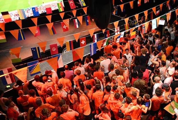 Dutch supporters gather in Rotterdam for Netherlands-Tunisia World Cup match ROTTERDAM, NETHERLANDS - JUNE 26: Dutch football supporters dressed in orange gather across Rotterdam to watch the Netherlands face Tunisia in the FIFA World Cup, WM, Weltmeisterschaft, Fussball in Rotterdam, Netherlands on June 26, 2026. Fans filled public viewing areas, cafes and city squares, creating a vibrant atmosphere as they cheered on the national team, Nationalteam during the group-stage fixture. Mouneb Taim Anadolu Rotterdam Netherlands. Editorial use only. Please get in touch for any other usage.  Copyright: x2026xAnadoluxMounebxTaimx