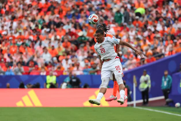 KANSAS CITY, MO - JUNE 25: Yan Valery 20 of Tunisia goes up to win a header in the first half of the FIFA World Cup, WM, Weltmeisterschaft, Fussball 2026 Group F match between Tunisia and Netherlands on June 25, 2026 at Kansas City Stadium in Kansas City, MO. (Photo by Scott Winters Icon Sportswire) SOCCER: JUN 25 FIFA World Cup 26 Group F - Tunisia vs Netherlands EDITORIAL USE ONLY Icon2606250213