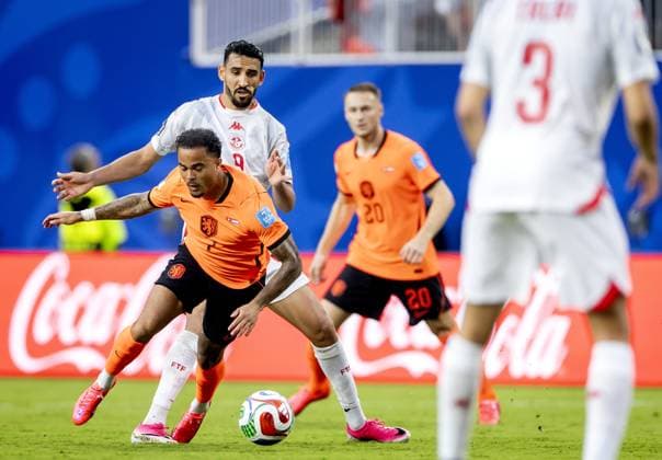 KANSAS - (lr) Justin Kluivert for the Netherlands, Hazem Mastouri for Tunisia during the 2026 FIFA World Cup, WM, Weltmeisterschaft, Fussball Group F match between Tunisia and the Netherlands at Kansas City Stadium on June 25, 2026, in Kansas, United States. KOEN VAN WEEL ANP FIFA World Cup 2026 group stage 2026 xVIxANPxSportx xxANPxIVx 562008637 originalFilename: 562008637.jpg