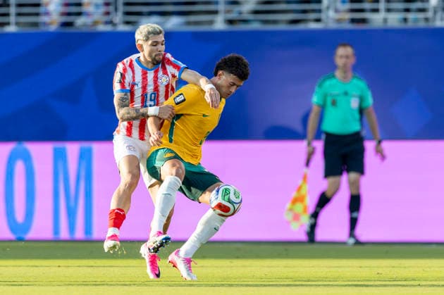 SANTA CLARA, CA - JUNE 25: Julio Enciso 19 of Paraguay and Alessandro Circati 3 of Australia fight for the ball during the FIFA World Cup, WM, Weltmeisterschaft, Fussball Group D match between Paraguay and Australia on June 25, 2026 at San Francisco Bay Area Stadium in Santa Clara, CA. (Photo by Bob Kupbens Icon Sportswire) SOCCER: JUN 25 FIFA World Cup 26 Group D - Paraguay vs Australia EDITORIAL USE ONLY Icon260625023