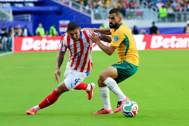 June 25, 2026, Santa Clara, California, USA: Santa Clara, USA - June 25 2026: Juan Jose CoÂ¡ceres 4 of Paraguay and Aziz Behwich 16 of Australia during a FIFA World Cup, WM, Weltmeisterschaft, Fussball group match between Paraguay and Australia at San Francisco Bay Area Stadium World Cup 2026: Group D: Paraguay Vs Australia  - ZUMAp121 20260625_zsp_p121_035 Copyright: xChrisxPutnamx