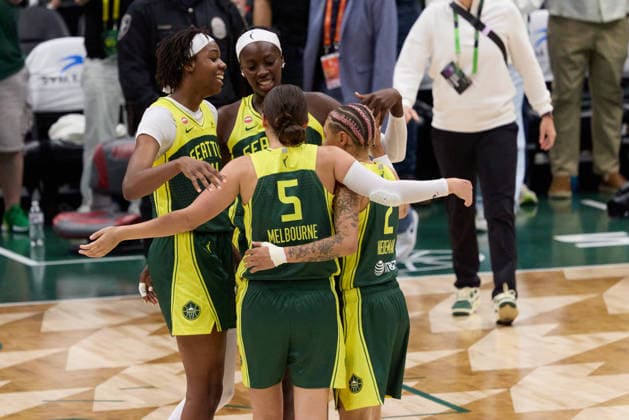 June 25, 2026, Seattle, Washington, USA: Seattle Storm center DOMINIQUE MALONGA (14), center AWA FAM (11), guard JADE MELBOURNE (5) and guard NATISHA HIEDEMAN (2) share an embrace following their teamÃ¢â‚¬â ¢s victory in the WNBA, Basketball Damen, USA match between the Seattle Storm and New York Liberty at Climate Pledge Arena in Seattle. WNBA 2026: Seattle 99:88 New York  - ZUMAd218 20260625_zsp_d218_034 Copyright: xRichardxDizonx
