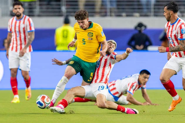 SANTA CLARA, CA - JUNE 25: Julio Enciso 19 of Paraguay attempts to tackle Jordan Bos 5 of Australia during the FIFA World Cup, WM, Weltmeisterschaft, Fussball Group D match between Paraguay and Australia on June 25, 2026 at San Francisco Bay Area Stadium in Santa Clara, CA. (Photo by Bob Kupbens Icon Sportswire) SOCCER: JUN 25 FIFA World Cup 26 Group D - Paraguay vs Australia EDITORIAL USE ONLY Icon260625042