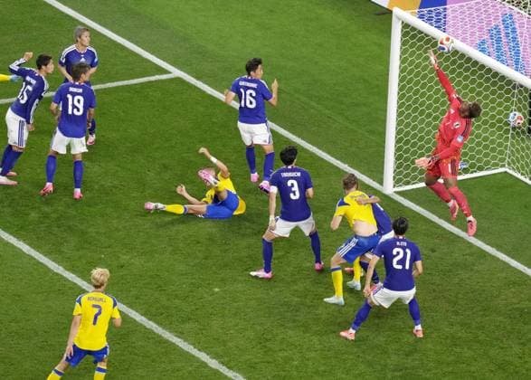 Football: 2026 World Cup Japan goalkeeper Zion Suzuki (far R) makes a save late in the second half of a World Cup Group F football match against Sweden at Dallas Stadium in Arlington, Texas, on June 25, 2026.  A14AA0005620305P