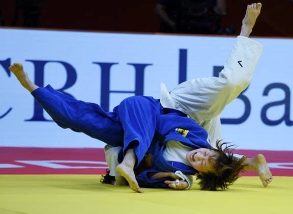 (260626) -- QINGDAO, June 26, 2026 -- Fujishiro Kokoro (Front) of Japan competes against Mascha Ballhaus of Germany during the women s -52kg final match at the IJF World Judo Tour Qingdao Grand Prix 2026 in Qingdao, east China s Shandong Province, June 26, 2026. ) (SP)CHINA-QINGDAO-JUDO-GRAND PRIX 2026(CN) LixZiheng 