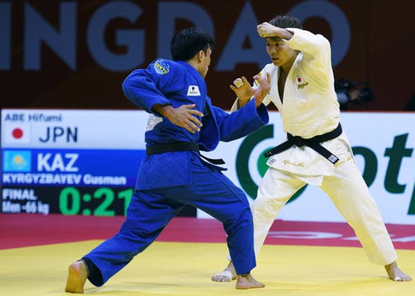 (260626) -- QINGDAO, June 26, 2026 -- Abe Hifumi (R) of Japan competes against Gusman Kyrgyzbayev of Kazakhstan during the men s -66kg final match at the IJF World Judo Tour Qingdao Grand Prix 2026 in Qingdao, east China s Shandong Province, June 26, 2026. ) (SP)CHINA-QINGDAO-JUDO-GRAND PRIX 2026(CN) LixZiheng 