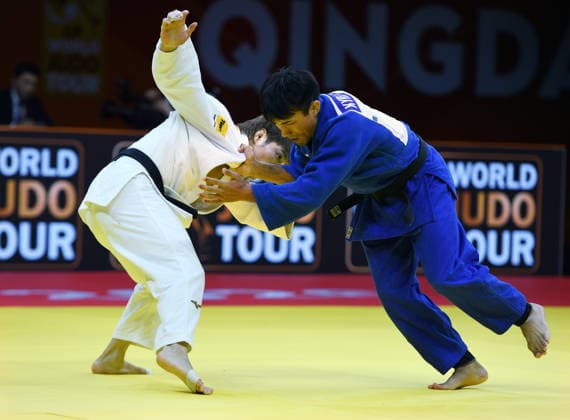 (260626) -- QINGDAO, June 26, 2026 -- Abe Hifumi (L) of Japan competes against Gusman Kyrgyzbayev of Kazakhstan during the men s -66kg final match at the IJF World Judo Tour Qingdao Grand Prix 2026 in Qingdao, east China s Shandong Province, June 26, 2026. ) (SP)CHINA-QINGDAO-JUDO-GRAND PRIX 2026(CN) LixZiheng 