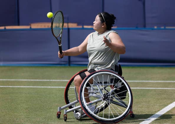 RECORD DATE NOT STATED 26th June 2026; Devonshire Park Lawn Tennis Club, Eastbourne, East Sussex, England; Uniqlo Wheelchair Tennis Tour Eastbourne Open Tennis, Day Six; Ziying Wang (CHN) plays a backhand shot against Diede De Groot (NED) HongboxChen