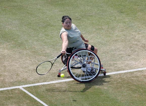 RECORD DATE NOT STATED 26th June 2026; Devonshire Park Lawn Tennis Club, Eastbourne, East Sussex, England; Uniqlo Wheelchair Tennis Tour Eastbourne Open Tennis, Day Six; Ziying Wang (CHN) plays a forehand shot against Diede De Groot (NED) HongboxChen