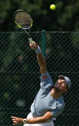 Belgian Raphael Collignon pictured in action during the afternoon training session the preparations ahead of the Wimbledon grand slam tennis tournament in London, Britain, Friday 26 June 2026. The main tournament is starting on Monday 29th June. BENOITxDOPPAGNE  x179396089x