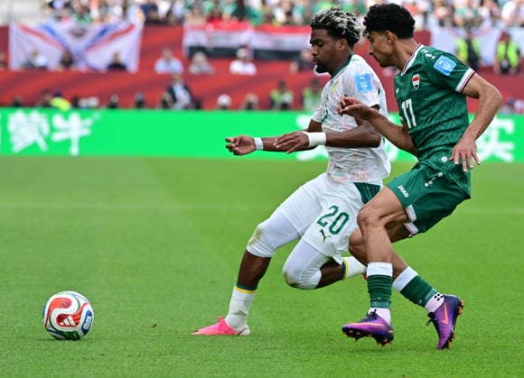 RECORD DATE NOT STATED FIFA World Cup, WM, Weltmeisterschaft, Fussball 2026 - Group I - Senegal vs Iraq Ibrahim Mbaye of Senegal (L) and Ali Jasim of Iraq in action during the FIFA World Cup 2026 group stage match Senegal against Iraq, in Toronto, Canada, 26 June 2026. TORONTO United States  Copyright: xEDUARDOxLIMAx
