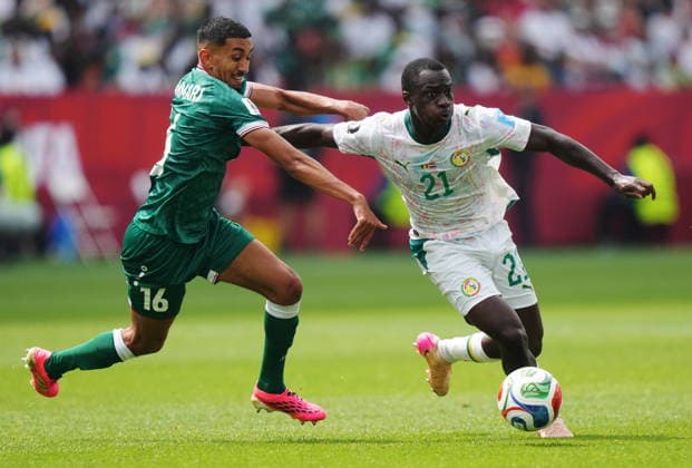 June 26, 2026, Toronto, On, CANADA: Senegal s Habib Diarra (21) moves past Iraq s Amir al-Ammari (16) during the first half of a World Cup Group I soccer match, in Toronto on Friday, June 26, 2026. Canada News - June 26, 2026  - ZUMAc35_ 20260626_zaf_c35_164 Copyright: xNathanxDenettex