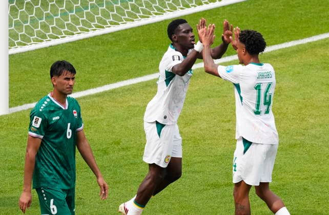 June 26, 2026, Toronto, On, CANADA: Senegal s Ismaila Sarr (centre) celebrates his goal with Ismail Jakobs (14) as Iraq s Manaf Younis (6) walks by during the second half of a World Cup Group I soccer match, in Toronto on Friday, June 26, 2026. Canada News - June 26, 2026  - ZUMAc35_ 20260626_zaf_c35_196 Copyright: xChrisxYoungx